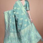 Teal Green Banarasi Silk Saree with Intricate Zari Motifs & Peacock Design
