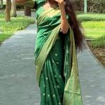 Exuberant Green Soft Silk Saree With Elision Blouse Piece