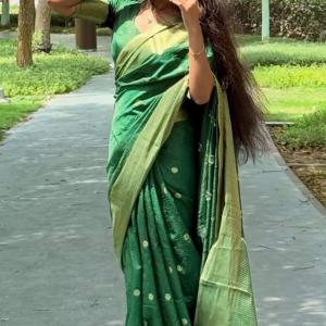 Exuberant Green Soft Silk Saree With Elision Blouse Piece