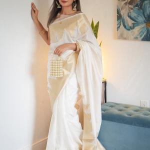 Symmetrical Beige Soft Silk Saree With Cynosure Blouse Piece