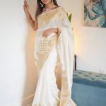 Symmetrical Beige Soft Silk Saree With Cynosure Blouse Piece