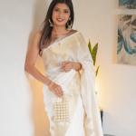 Symmetrical Beige Soft Silk Saree With Cynosure Blouse Piece