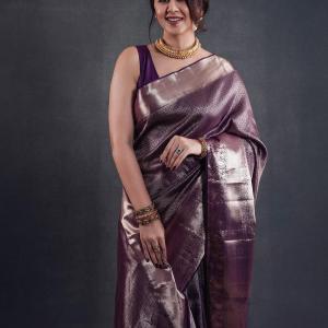 Evanescent Purple Soft Silk Saree With Brood Blouse Piece