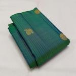Sumptuous Rama Soft Silk Saree With Surpassing Blouse Piece