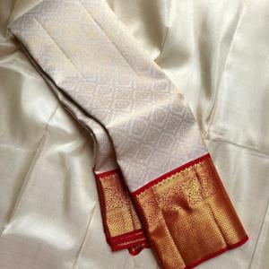 Inimitable Beige Soft Silk Saree With Effulgent Blouse Piece