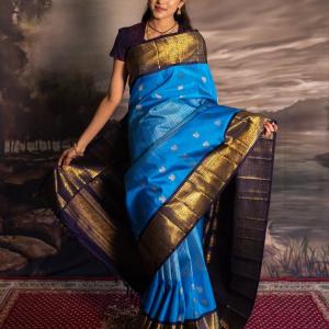 Majestic Firozi Soft Silk Saree With Luminous Blouse Piece