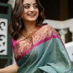 Dissemble Sea Green Soft Silk Saree With Pleasant Blouse Piece