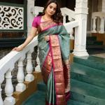 Dissemble Sea Green Soft Silk Saree With Pleasant Blouse Piece