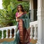 Dissemble Sea Green Soft Silk Saree With Pleasant Blouse Piece