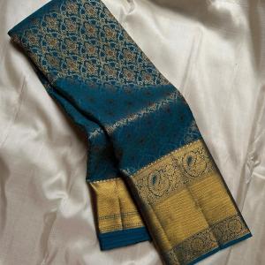 Mesmeric Rama Soft Banarasi Silk Saree With Breathtaking Blouse Piece