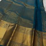 Mesmeric Rama Soft Banarasi Silk Saree With Breathtaking Blouse Piece
