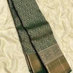 Eloquence Dark Green Soft Banarasi Silk Saree With Engrossing Blouse Piece