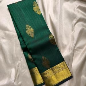 Desirable Dark Green Soft Banarasi Silk Saree With Whimsical Blouse Piece