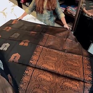 Gratifying Black Soft Banarasi Silk Saree With Intricate Blouse Piece