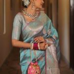 Scintillating Firozi Soft Banarasi Silk Saree With Preferable Blouse Piece