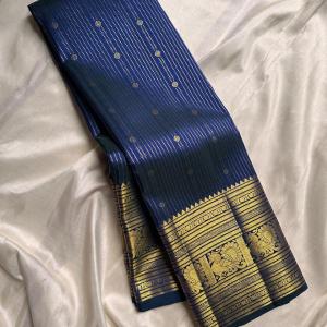 Engrossing Navy Blue Soft Banarasi Silk Saree With Gratifying Blouse Piece