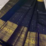 Engrossing Navy Blue Soft Banarasi Silk Saree With Gratifying Blouse Piece