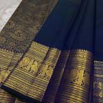 Engrossing Navy Blue Soft Banarasi Silk Saree With Gratifying Blouse Piece