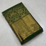 Divine Dark Green Soft Banarasi Silk Saree With Entrancing Blouse Piece