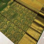 Divine Dark Green Soft Banarasi Silk Saree With Entrancing Blouse Piece