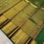 Divine Dark Green Soft Banarasi Silk Saree With Entrancing Blouse Piece