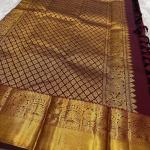 Embellished Maroon Soft Banarasi Silk Saree With Gossamer Blouse Piece