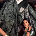 Tremendous Black Soft Banarasi Silk Saree With Elaborate Blouse Piece