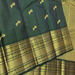 Divine Dark Green Pure Zari Weaving Banarasi Silk Saree With Diaphanous Blouse Piece