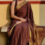 Evocative Brown Pure Zari Weaving Banarasi Silk Saree With Verdant Blouse Piece