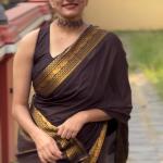 Evocative Brown Pure Zari Weaving Banarasi Silk Saree With Verdant Blouse Piece