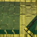 Traditional Dark Green Pure Zari Weaving Banarasi Silk Saree With Demure Blouse Piece