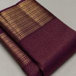 Symmetrical Purple Pure Banarasi Silk Saree With Energetic Blouse Piece