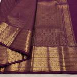 Symmetrical Purple Pure Banarasi Silk Saree With Energetic Blouse Piece