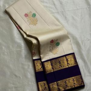 Scintilla Off White Pure Zari Weaving Banarasi Silk Saree With Desirable Blouse Piece