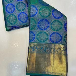 Profuse Firozi Pure Zari Weaving Banarasi Silk Saree With Resonant Blouse Piece