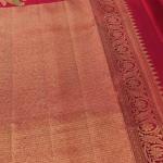 Surpassing Red Pure Zari Weaving Banarasi Silk Saree With Efflorescence Blouse Piece