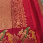 Surpassing Red Pure Zari Weaving Banarasi Silk Saree With Efflorescence Blouse Piece