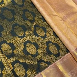 Profuse Dark Green Pure Zari Weaving Banarasi Silk Saree With Enchanting Blouse Piece