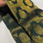 Profuse Dark Green Pure Zari Weaving Banarasi Silk Saree With Enchanting Blouse Piece