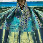 Gossamer Firozi Pure Banarasi Silk Saree With Girlish Blouse Piece