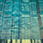 Gossamer Firozi Pure Banarasi Silk Saree With Girlish Blouse Piece