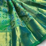 Staggering Parrot Pure Banarasi Silk Saree With Super classy Blouse Piece