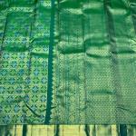 Staggering Parrot Pure Banarasi Silk Saree With Super classy Blouse Piece