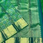 Staggering Parrot Pure Banarasi Silk Saree With Super classy Blouse Piece