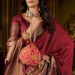 Tantalizing Maroon Pure Banarasi Silk Saree With Grandiose Blouse Piece