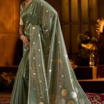 Murmurous Sea Green Soft Banarasi Tissue Silk Saree With Enticing Blouse Piece