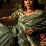 Murmurous Sea Green Soft Banarasi Tissue Silk Saree With Enticing Blouse Piece