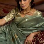 Murmurous Sea Green Soft Banarasi Tissue Silk Saree With Enticing Blouse Piece