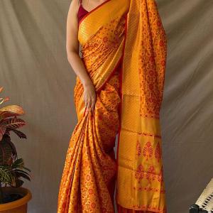 Jubilant Mustard Patola Silk Saree with Lovely Blouse Piece
