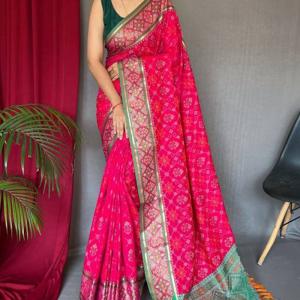 Incomparable Dark Pink Patola Silk Saree with Fairytale Blouse Piece